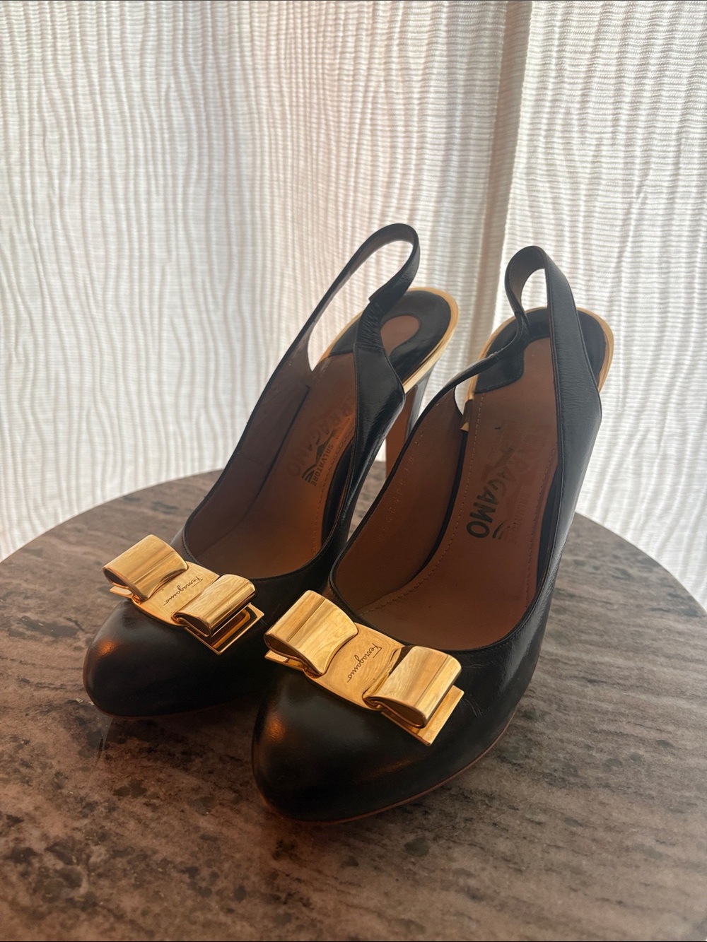 Salvatore Ferragamo Black Slingback Pumps with Gold Bow
